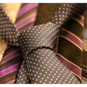 A close up of some ties and stripes