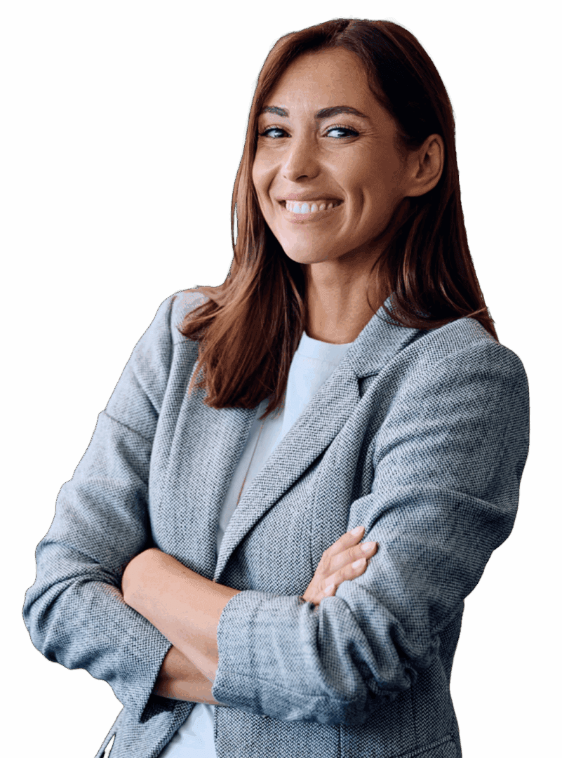Smiling woman in a light gray blazer with arms crossed.